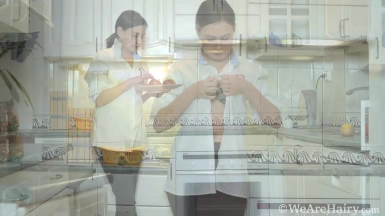 Eva Black masturbates on her kitchen chair