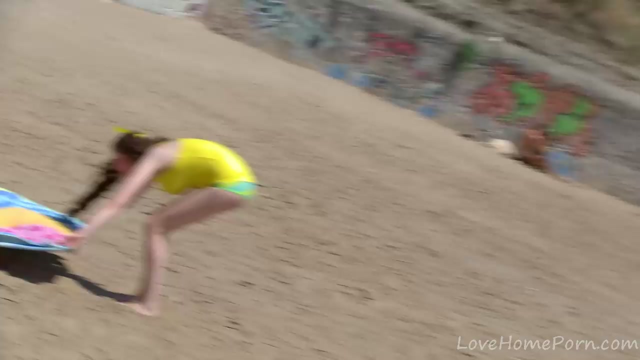 Long-Haired Beauty Rides Cock At Beach