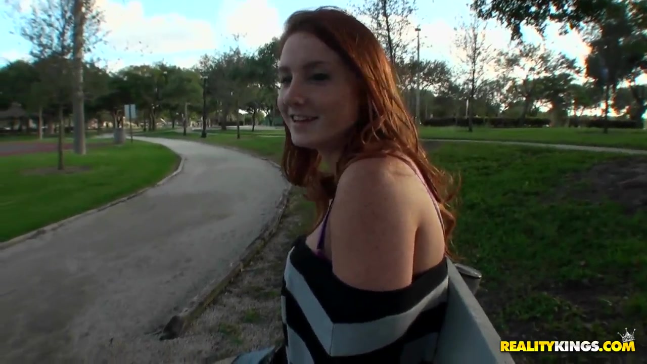 Hot read head Lindsey seduces Josh by showing him her laps and shoulders