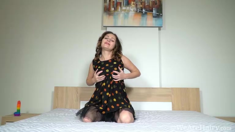 Sharon Rosie enjoys her rainbow dildo to orgasm - WeAreHairy