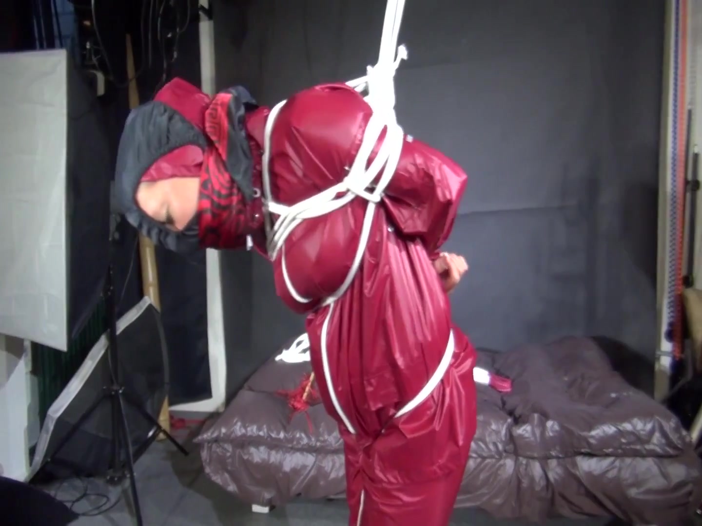Watch Sandra Beeing Bound Gagged And Pantyhooded In Her Shiny Nylon Rainwear
