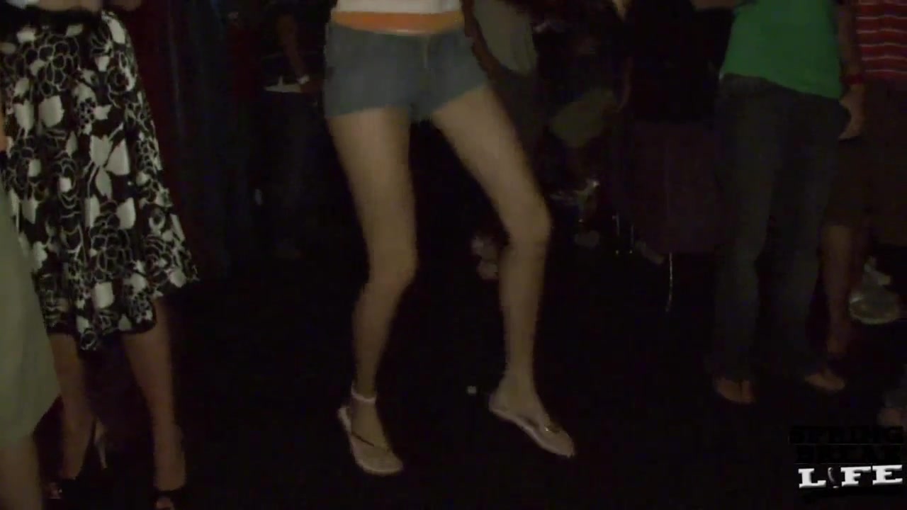 Girls Dancing and Flashing on the Bar in Spring Break Club South Padre - SpringbreakLife