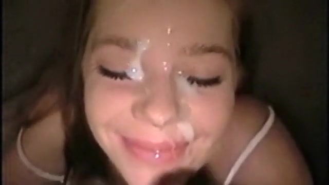 Amazing redhead receives a load of cum on her face