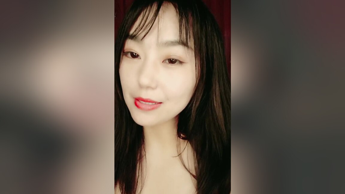 Sexy damsel becomes erotic in bathroom while showering.