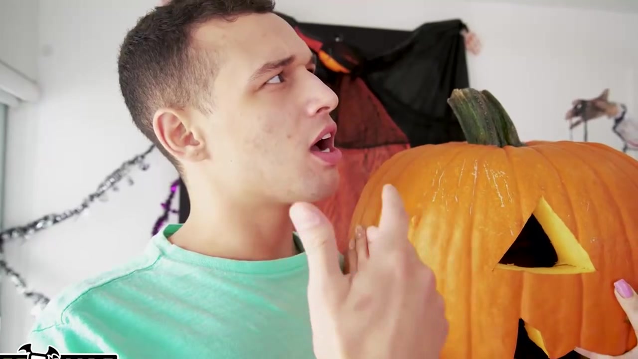 carving pumpkins with her stepson and stepdaughter