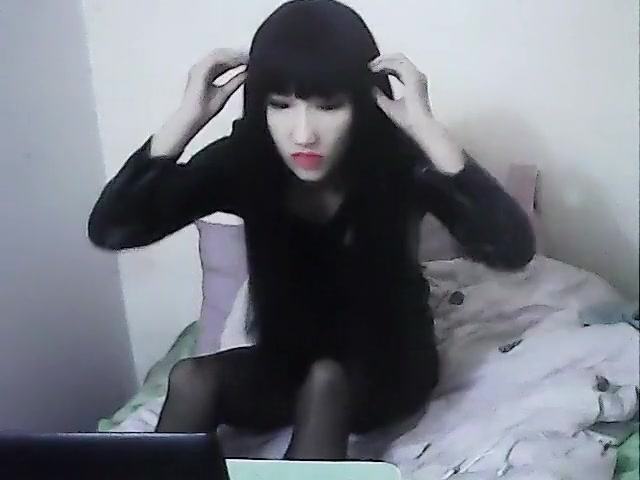 Chinese in female mask and leather with stocking