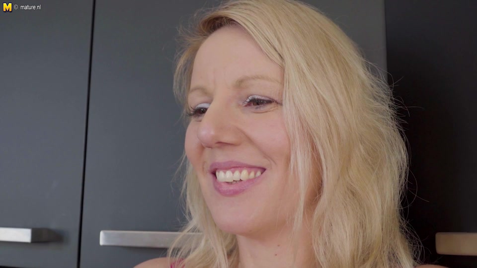Big dicked black guy fucking a MILF in her kitchen