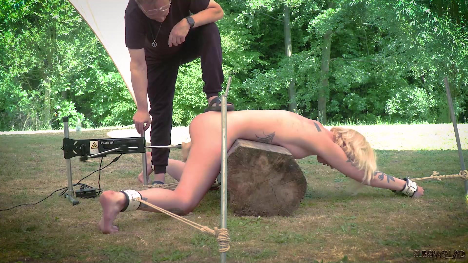 Naughty slave submissive in bondage sex game