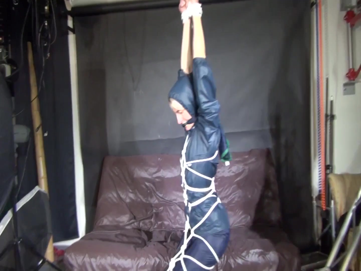 Watch Sonja Enjoying Bondage In Her Shiny Nylon Rainwear