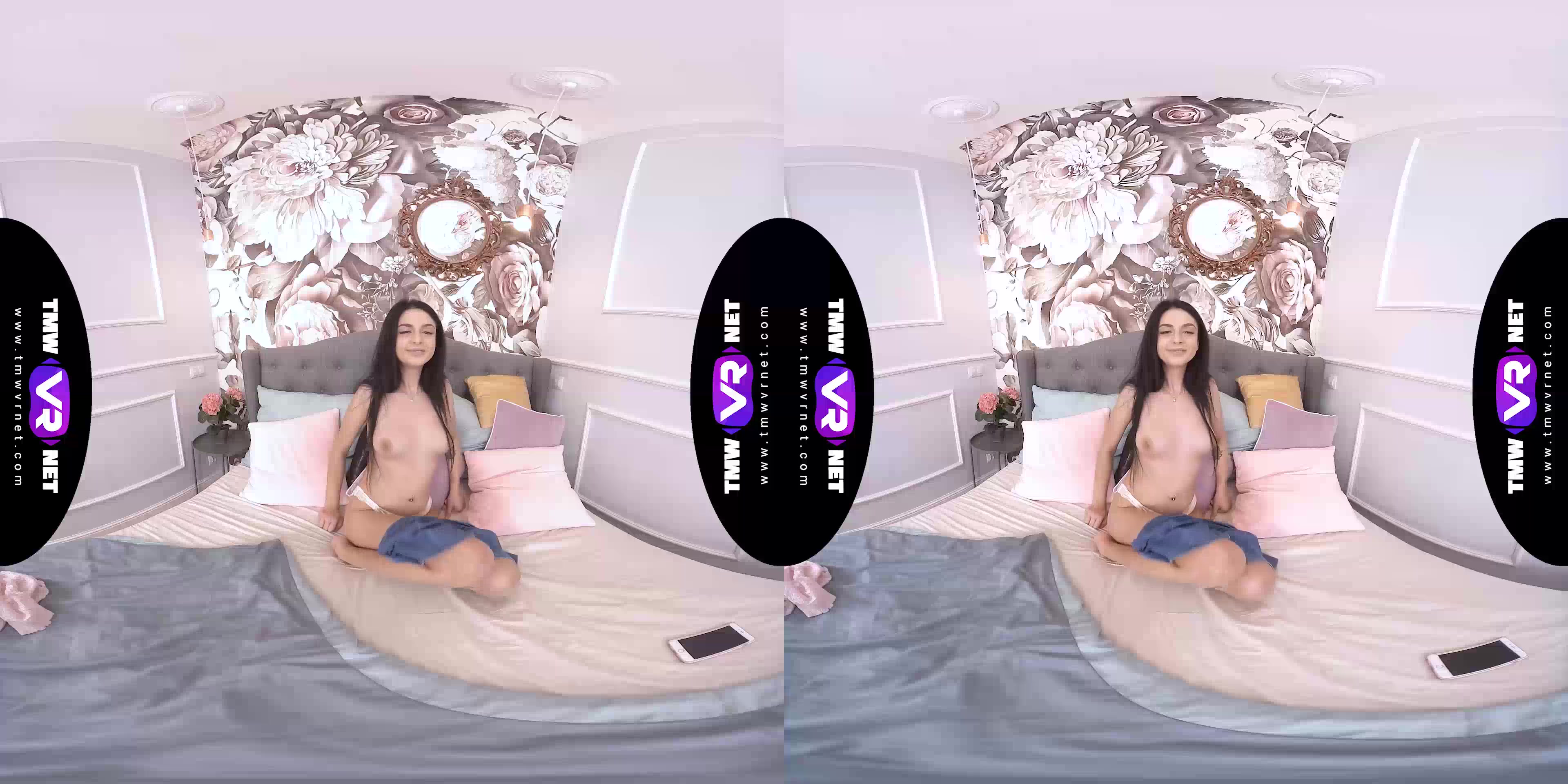 Orgasming with a phone in her hands