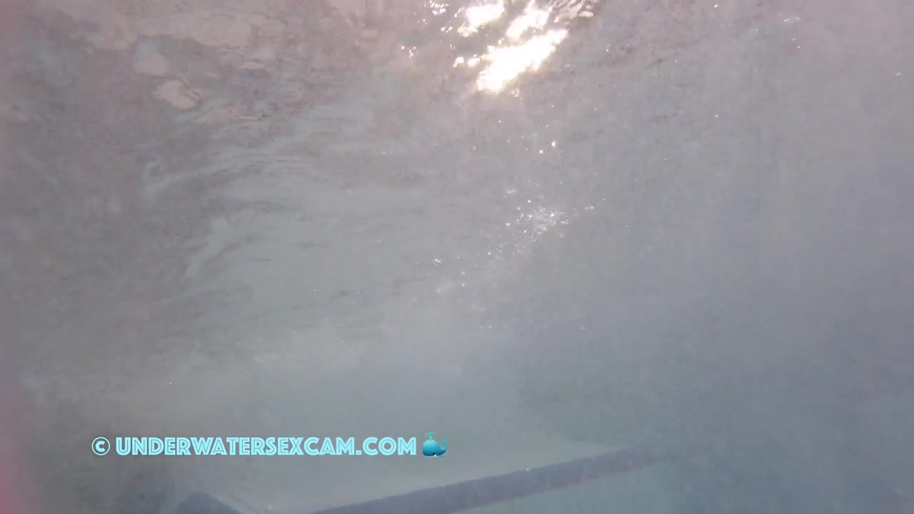 This Young Couple Plays Together Underwater In Front Of Many People