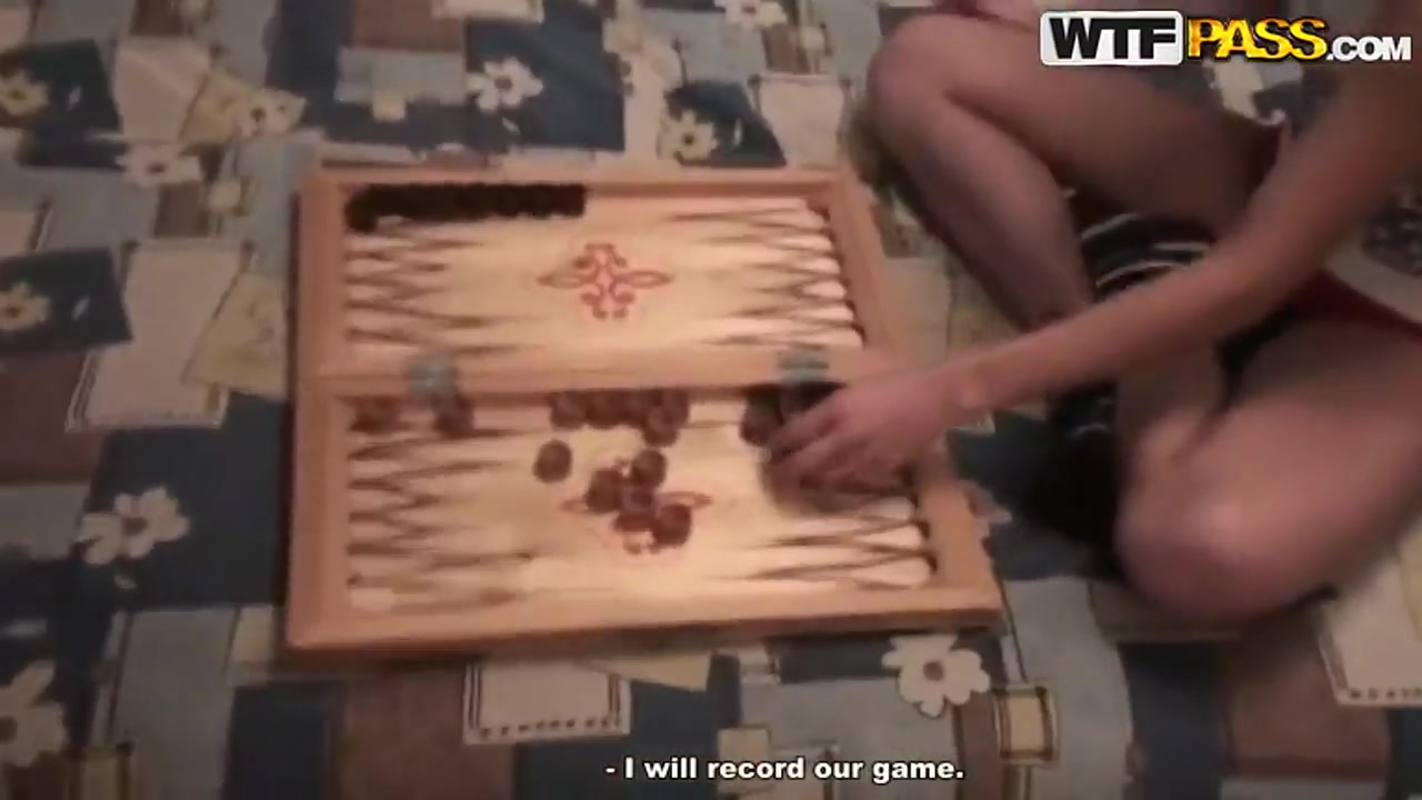 Russian girl Nastya and her classmate playing backgammon