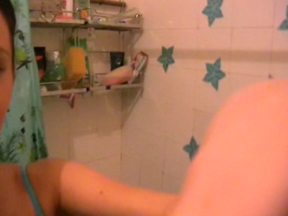Hot girlfriend masturbates in a shower