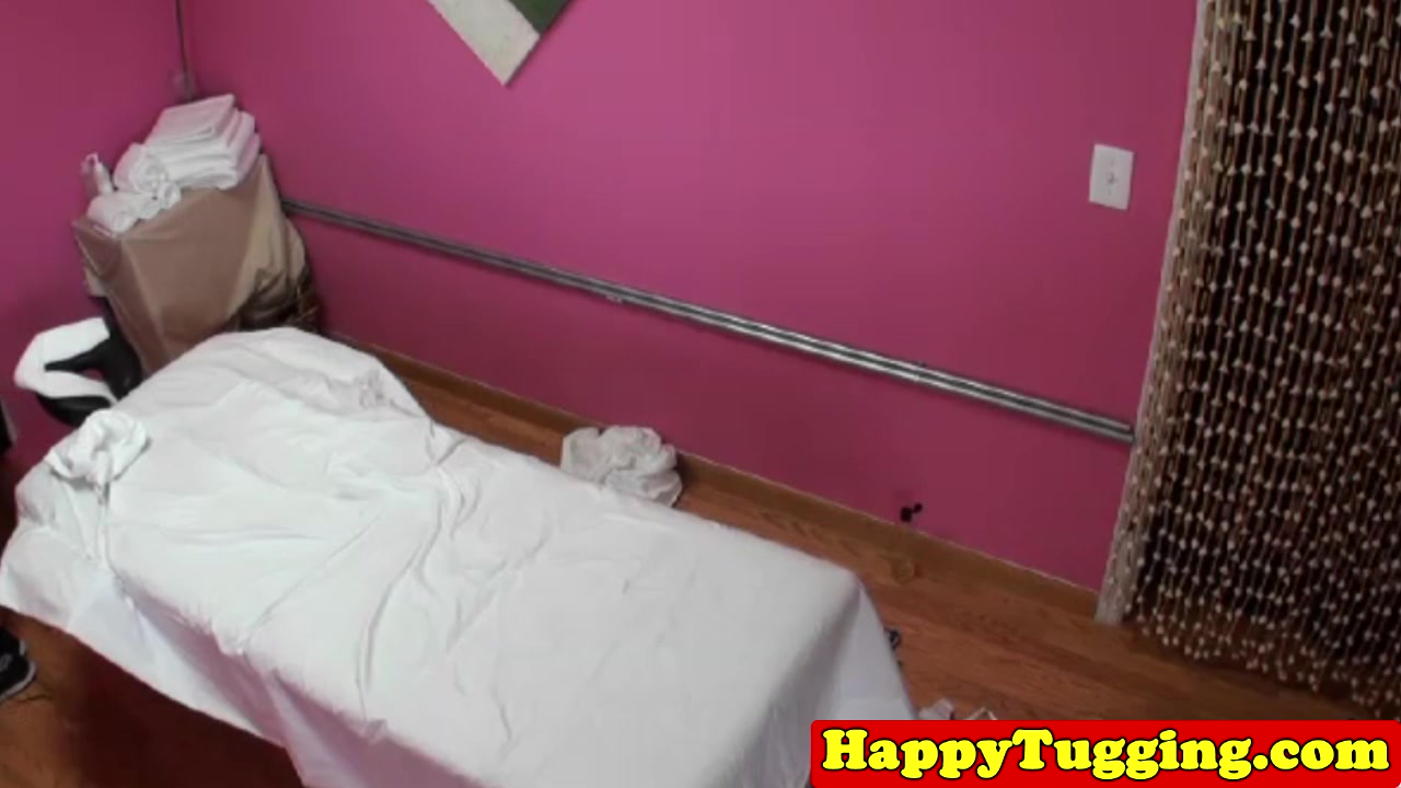 Asian masseuse wanking client cock