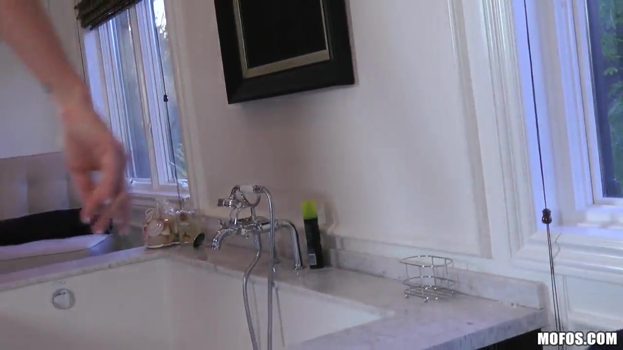 Gorgeous buxom goddess Ashley Roberts plays with water jet