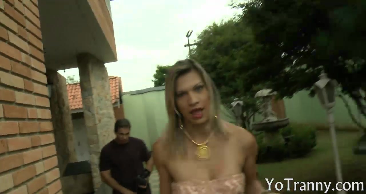Busty tranny sucks off and gets asshole fucked outdoors