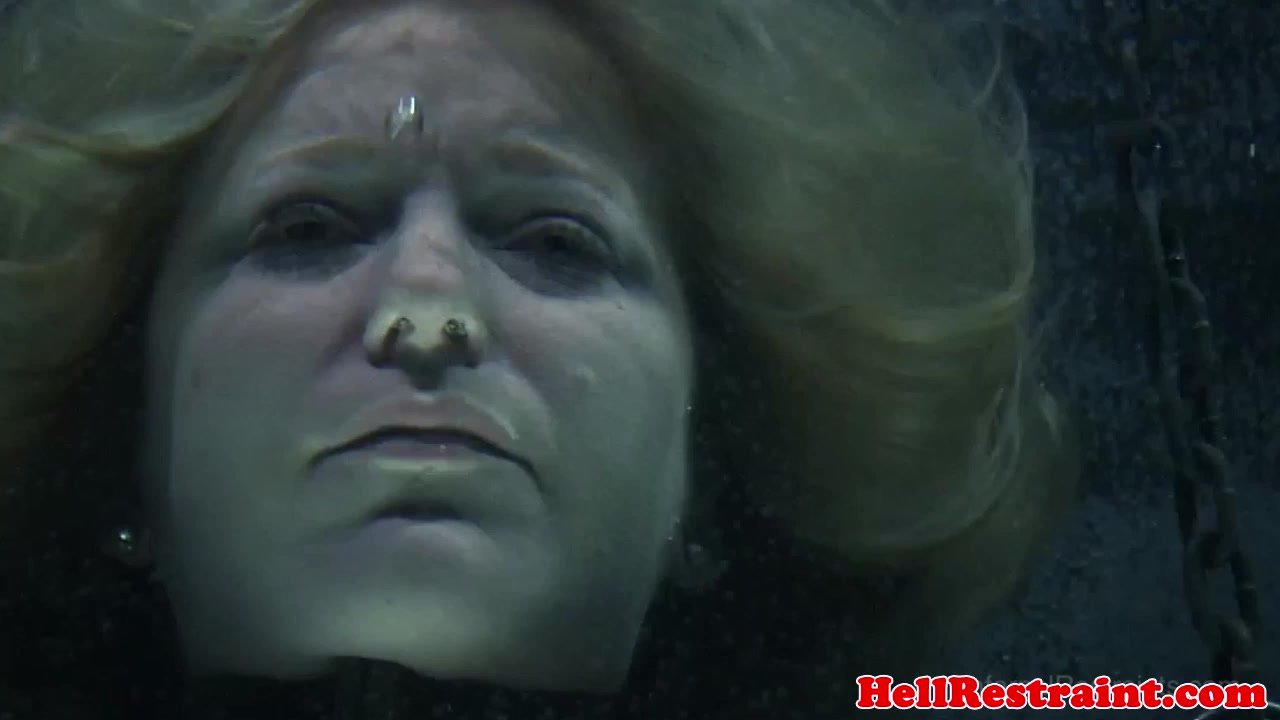 Restrained sub punished with water bondage