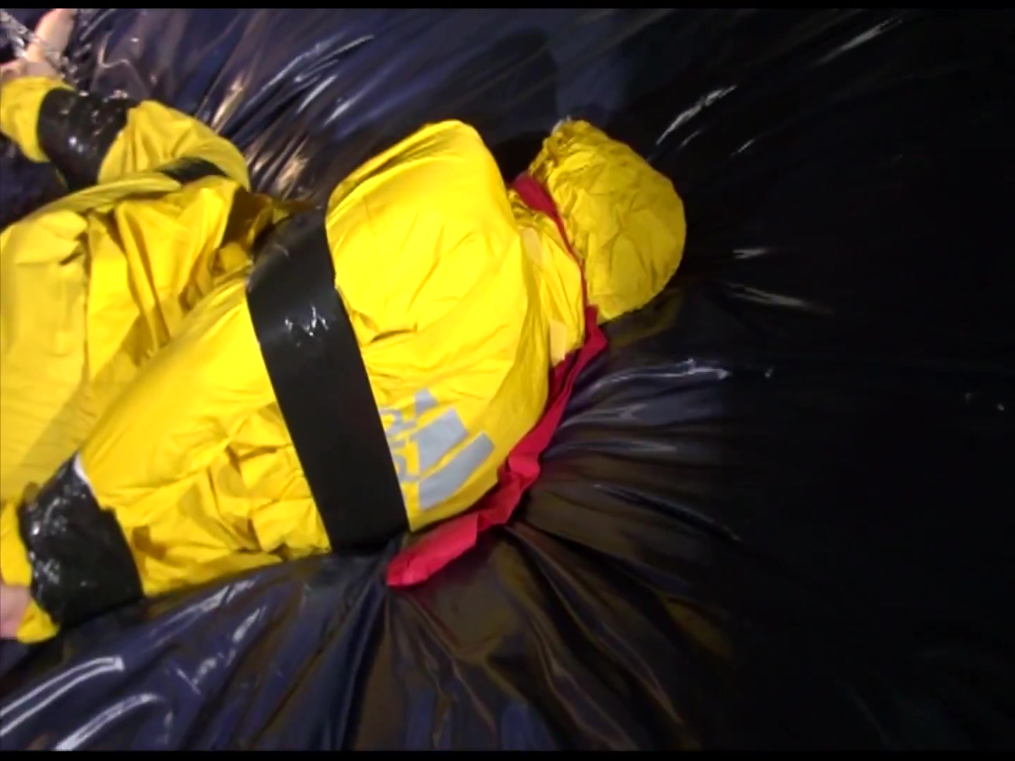 Get 2 Archivevideos With Sonja Enjoying Bondage In Her Shiny Nylon Rainwear