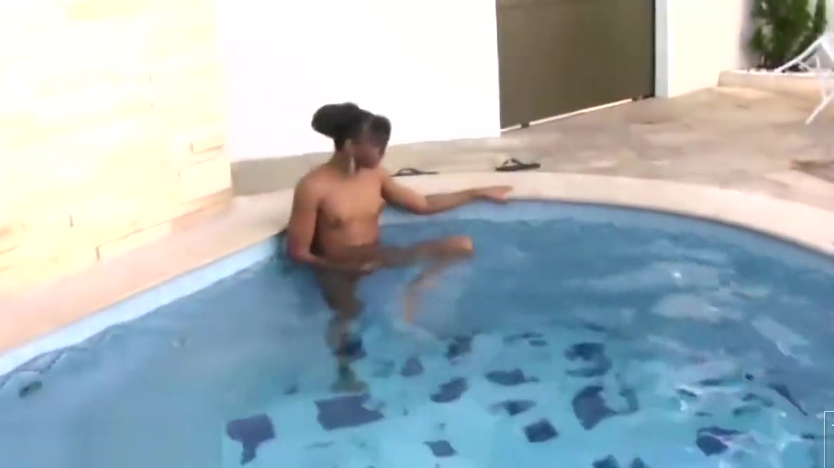 Ebony Latina tranny takes a dip in the pool and masturbates