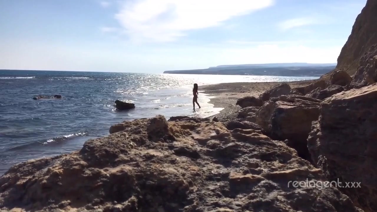 Alone lush Russian babe toys her cunt on the rock on the sea shore by Real Agent