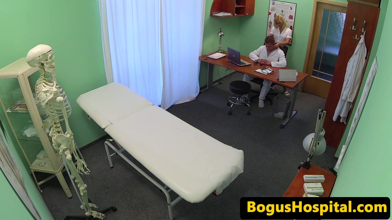 Nurse massaging patients big naturals
