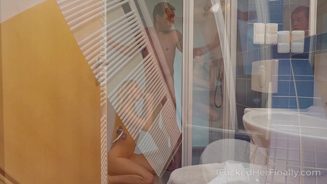 Blondie kneels in front of the landlord to please him