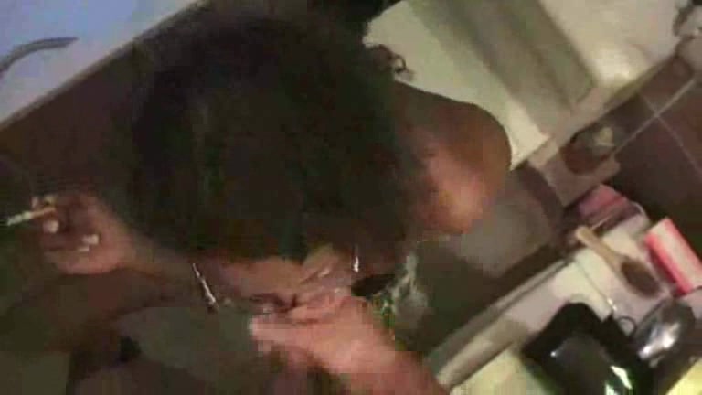 This Ebony has a seductive look on her face when she sucks dick