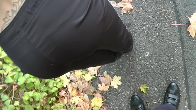 Brunette in funny panties blows cock outdoors