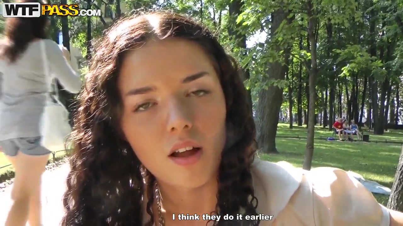 Cute curly brunette Leonora shows her boobs in park