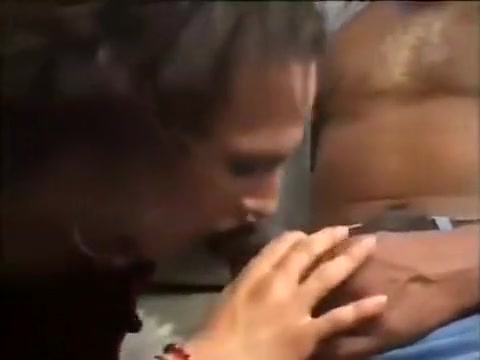 Crossdresser sucking long dark rod