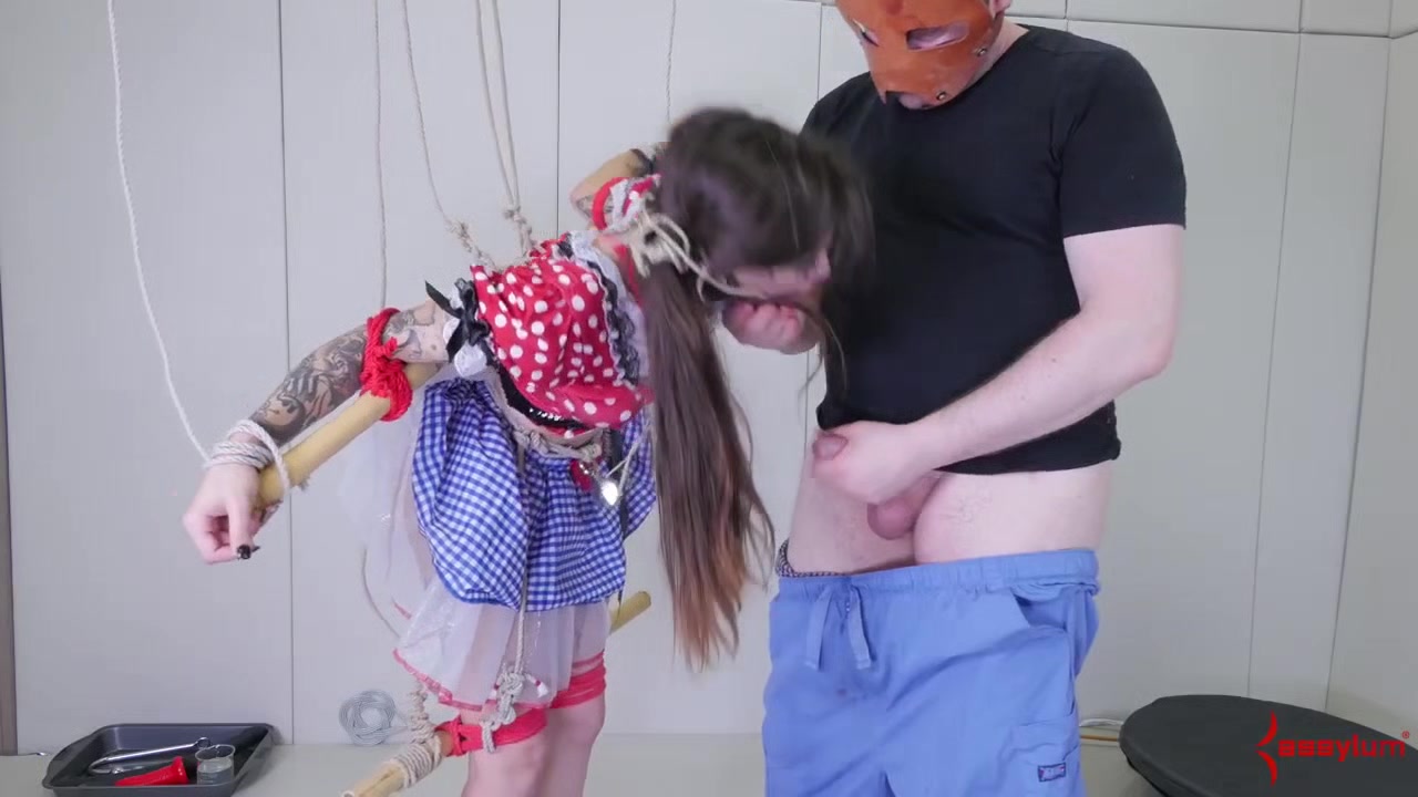 Tied up sub deepthroats dick