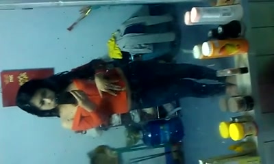 Asian slut films her naked boobies in the mirror