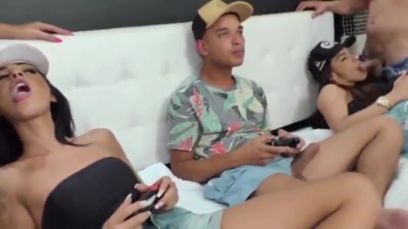 Three shemale and 2 guys having fun