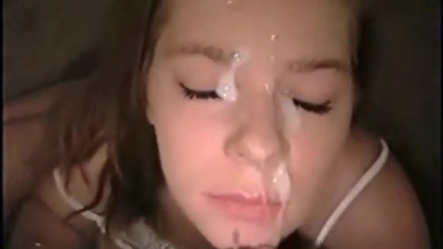 Amazing redhead receives a load of cum on her face