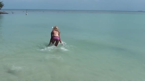 Curly babe at the beach