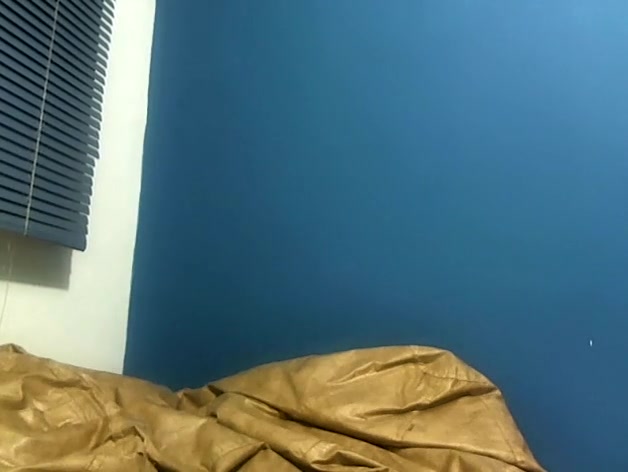Pig-tailed adorable gal sucking a lollipop and showing her cleavage