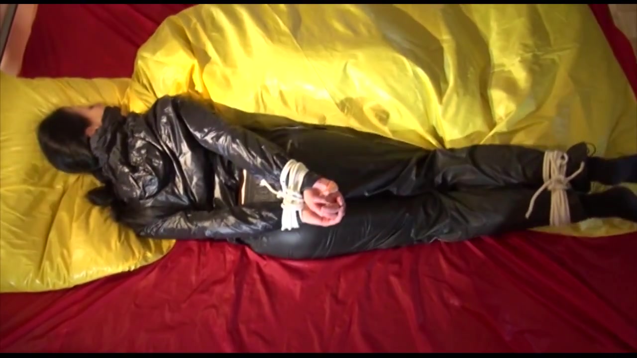 Get 2 Videos Of Lucy Tied And Gagged In Shiny Nylon Rain- And Sportswear From Our 2015 Archives