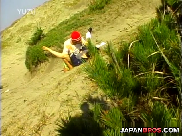 Busty Japanese gal gets things in her wet cunt