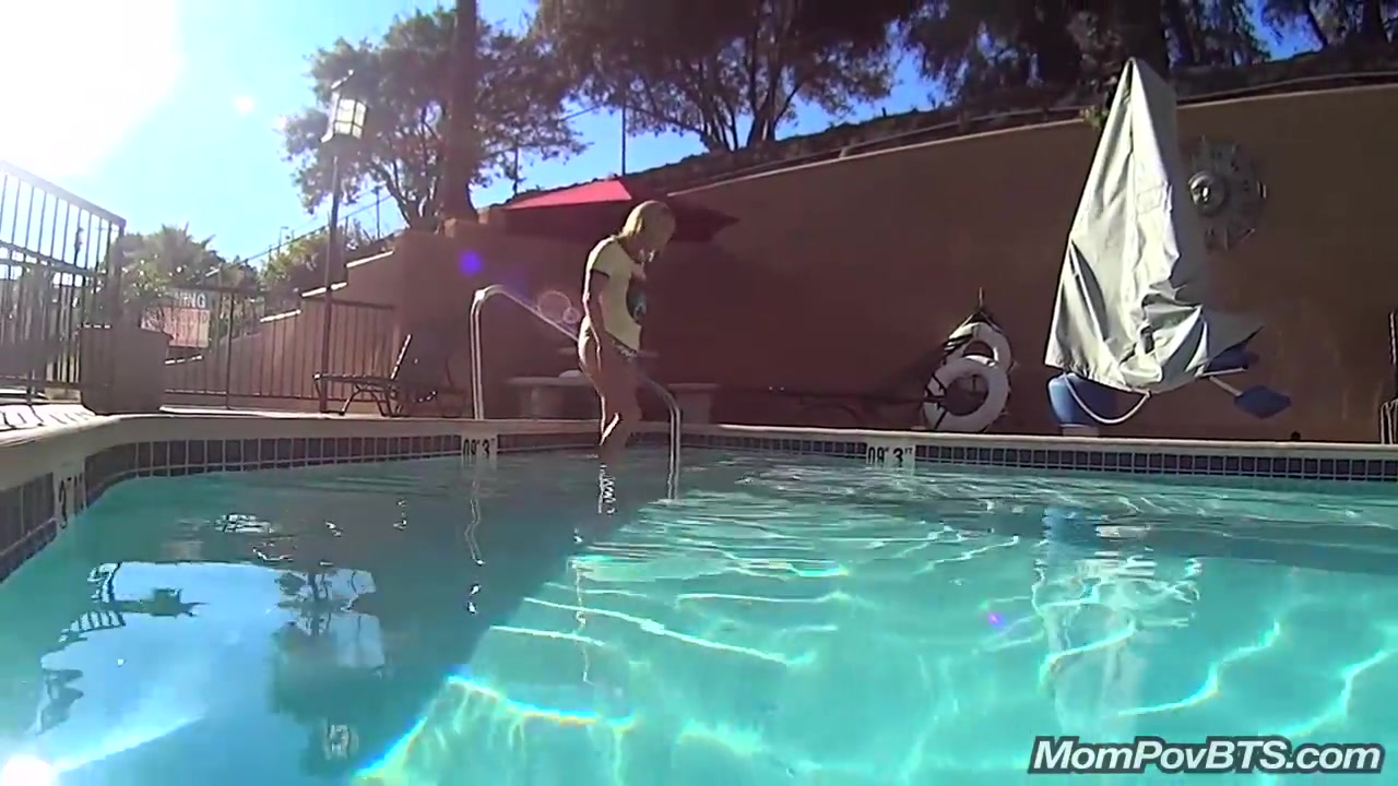 MILF in public pool before porn shoot