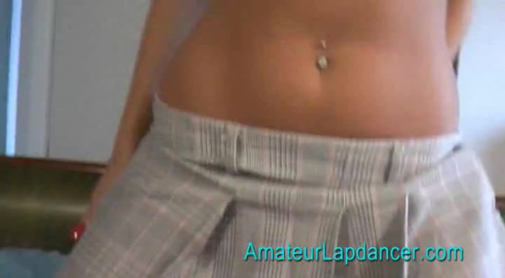 Horny tanned brunette in school outfit doing lapdance