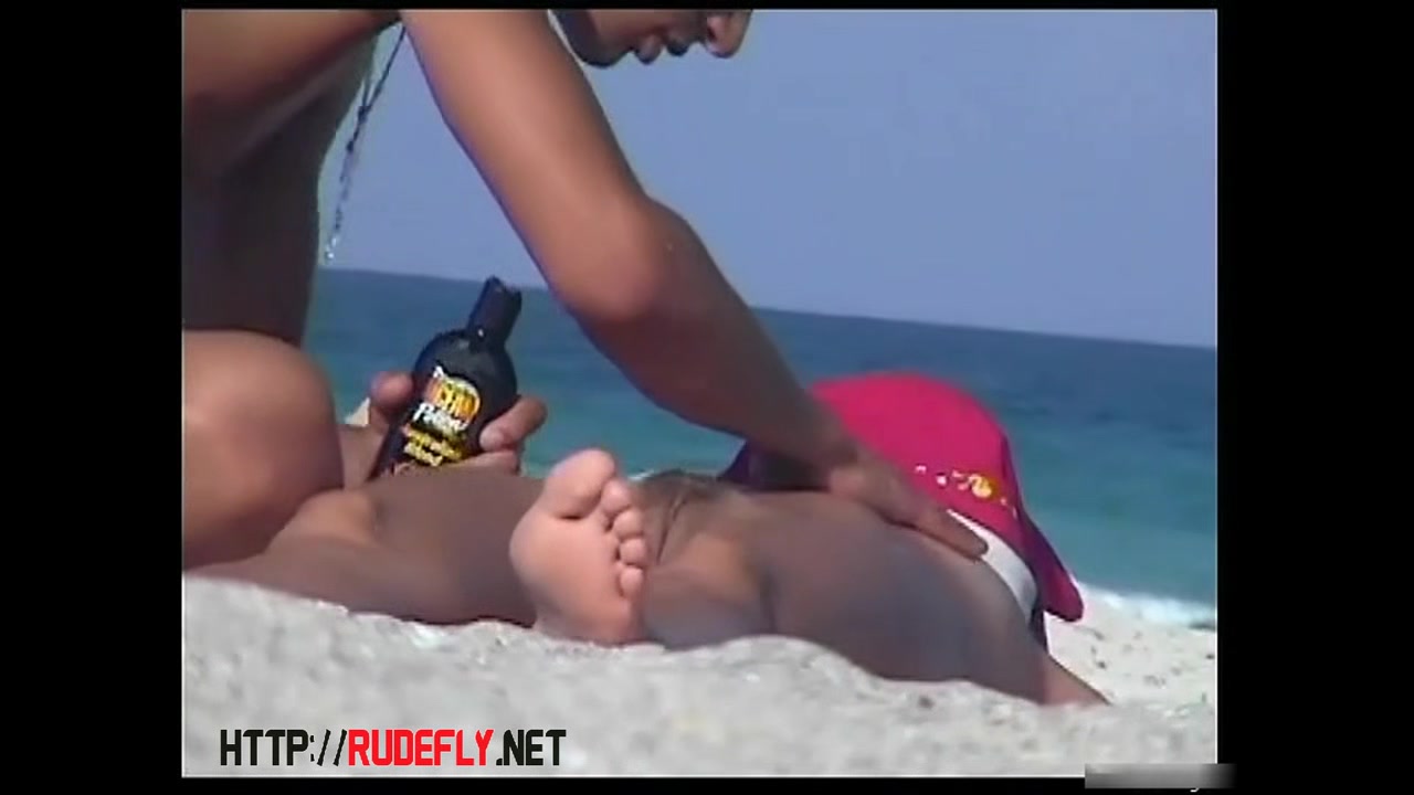 Chick caught on hidden webcam with no clothing on in a nudist beach camp