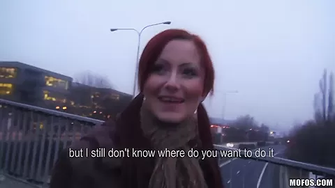 Redhead babe Belinda sucks meaty cock in public