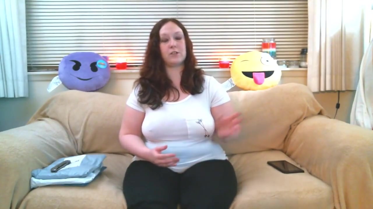 thick redhead tries on some clothes and shows off her ass and tight pussy