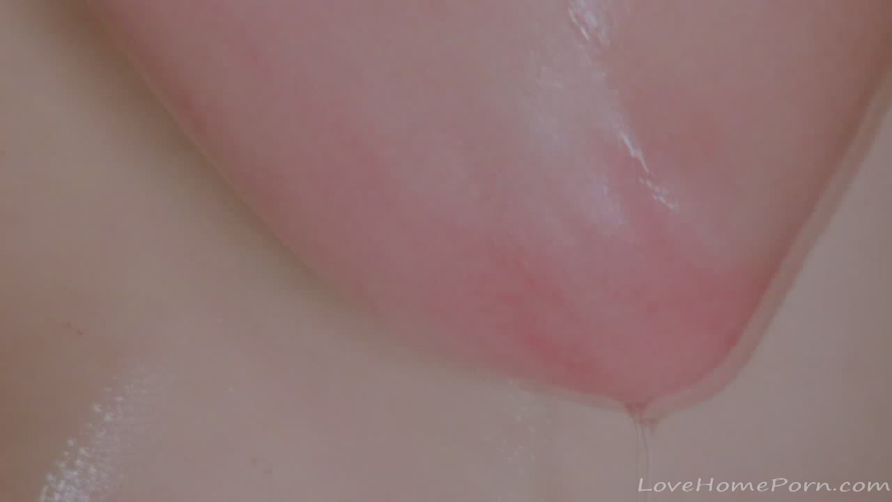 Pale beauty blushes while masturbating in shower