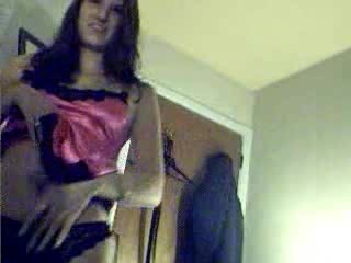 Pretty babe in pink stripping and masturbating