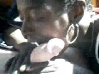 Black hussy sucks the life out of white dude's cock