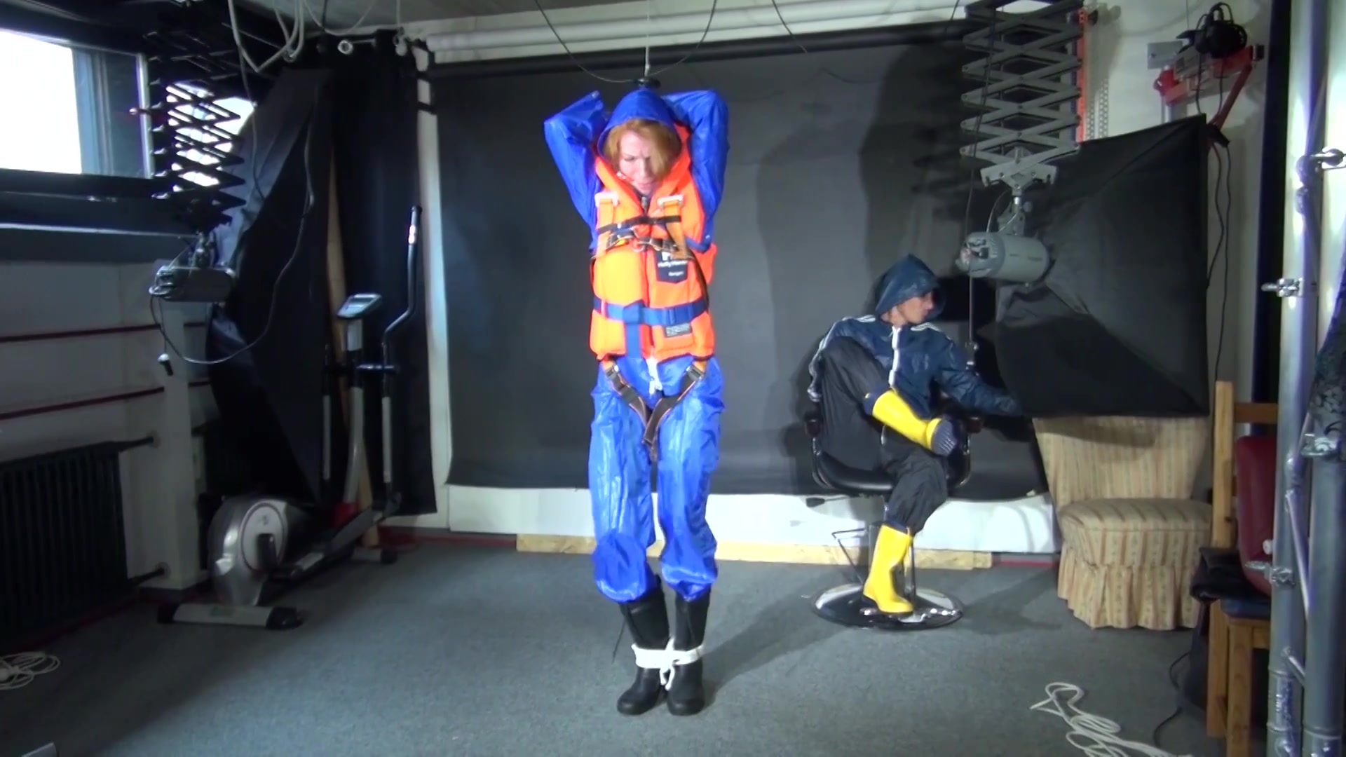 See Ronja Tied And Gagged By Stella In Shiny Nylon Rainwear And A Life Vest!