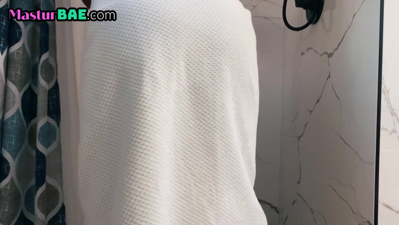 Black showering milf erotically masturbates in solo session