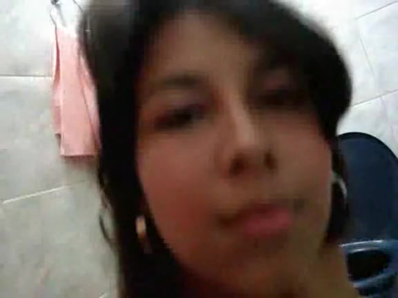 Hot Latina Strips in the Bathroom