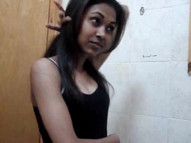 Adorable Oriental lady undresses very slow to let to fantasize